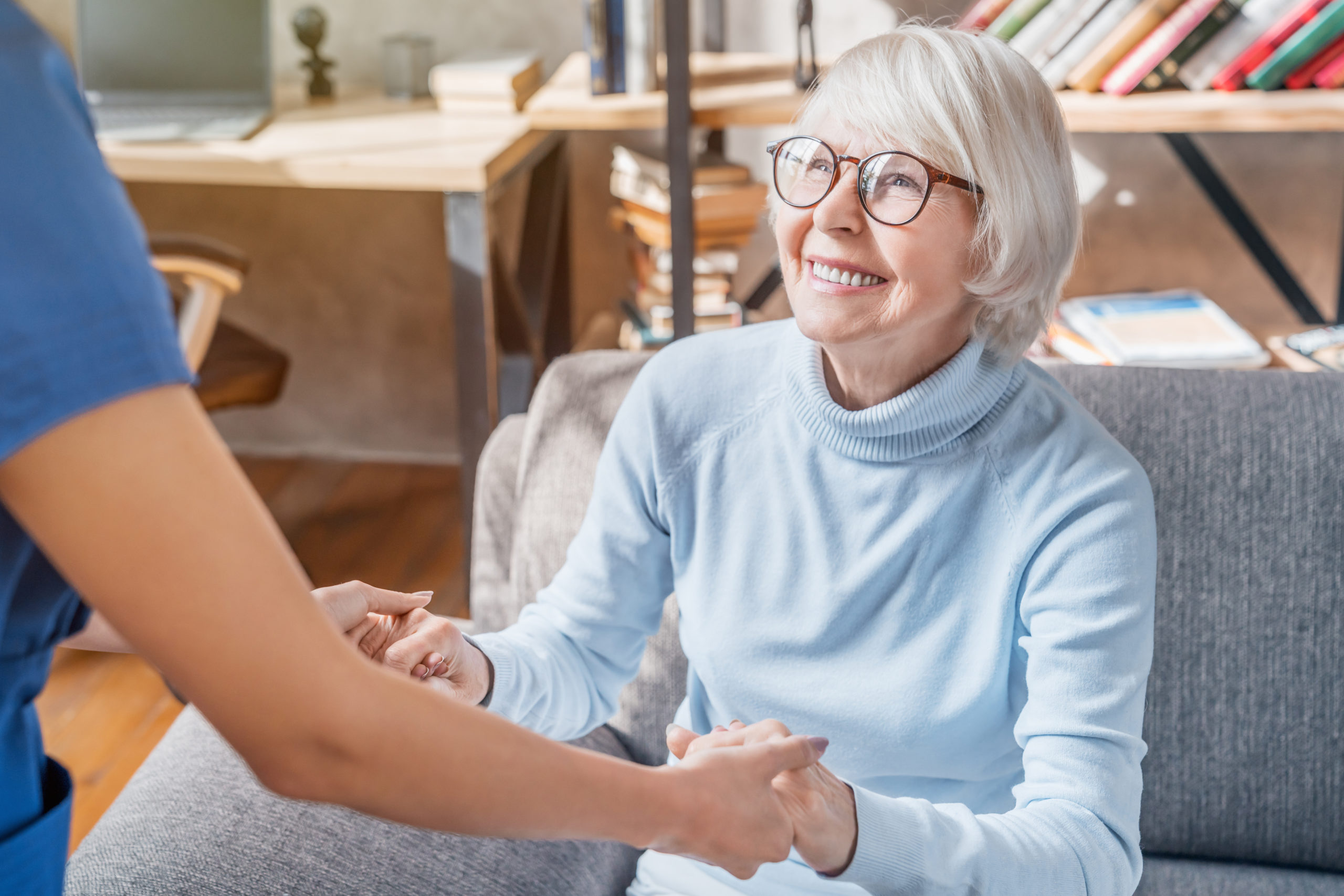 Employee Helping Happy Resident