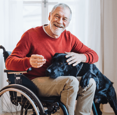 Man in Wheelchair with his Dog