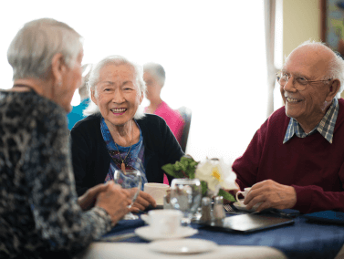 group of seniors eating together